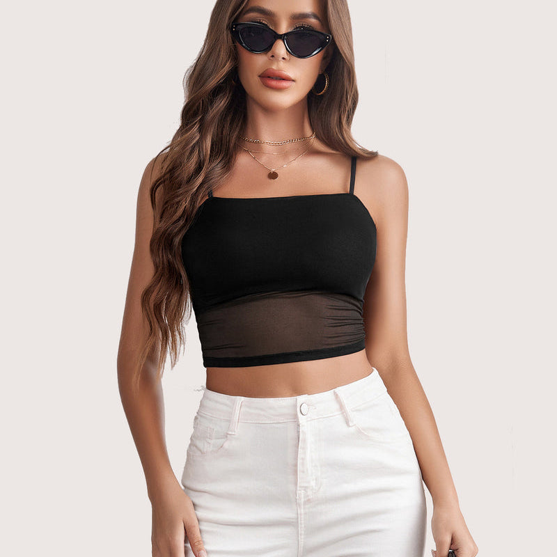 Black mesh spaghetti strap tank top, layered design, paired with white jeans for a flattering fit