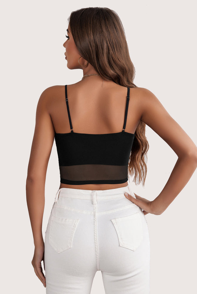 Black mesh spaghetti strap tank top, layered design, with white jeans for a flattering fit