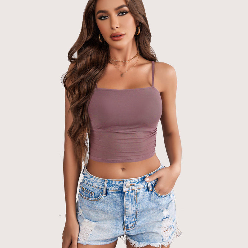 Mauve spaghetti strap tank top, square neck, paired with denim shorts, a flattering and stylish fit.