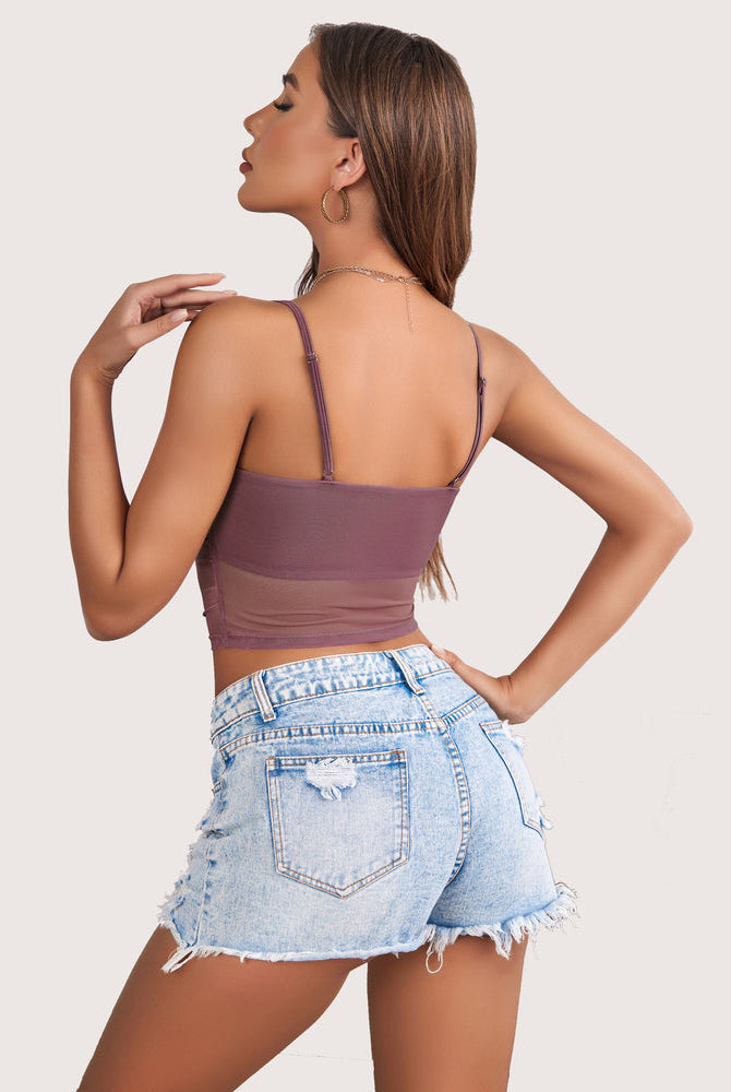 Mauve spaghetti strap mesh tank top, layered design, paired with denim shorts, stylish fit.