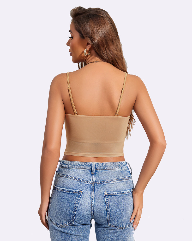 Beige mesh spaghetti strap tank top, layered design, paired with blue jeans. A flattering fit.