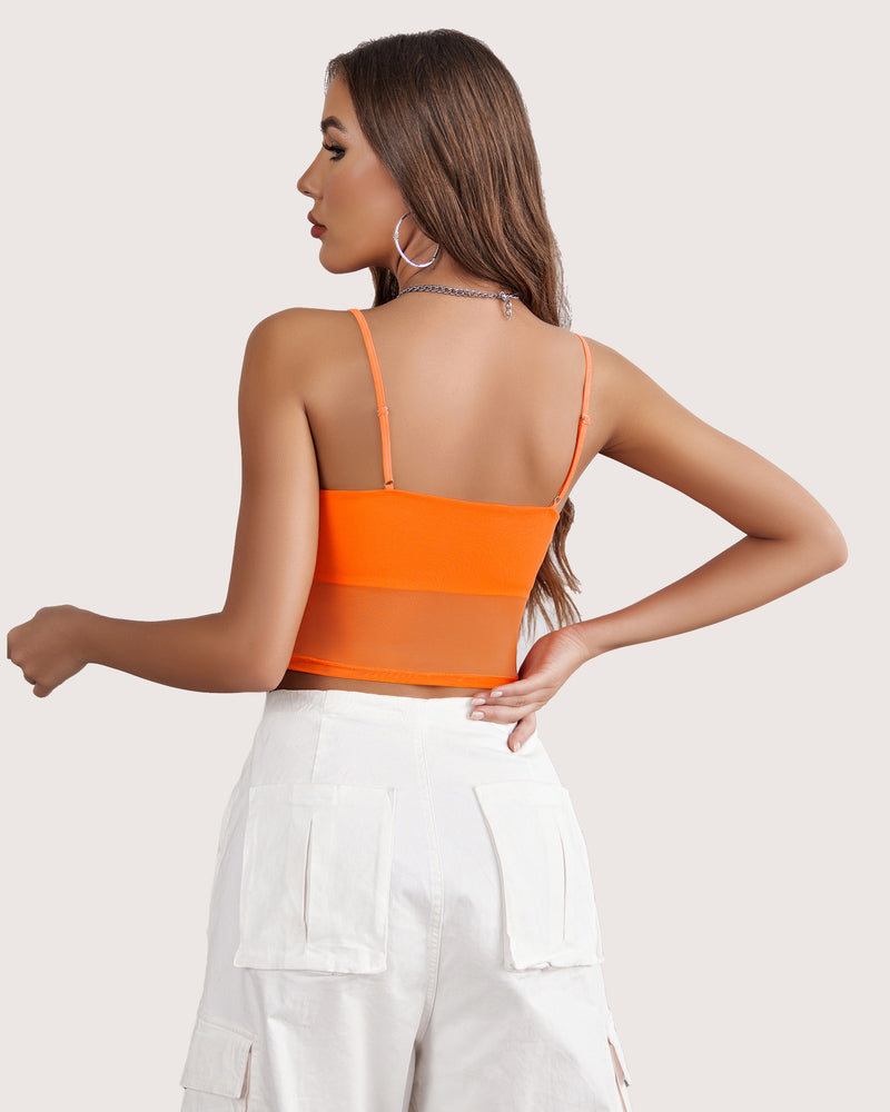 Orange mesh tank top, layered design, with white cargo pants. A flattering and stylish mesh top.