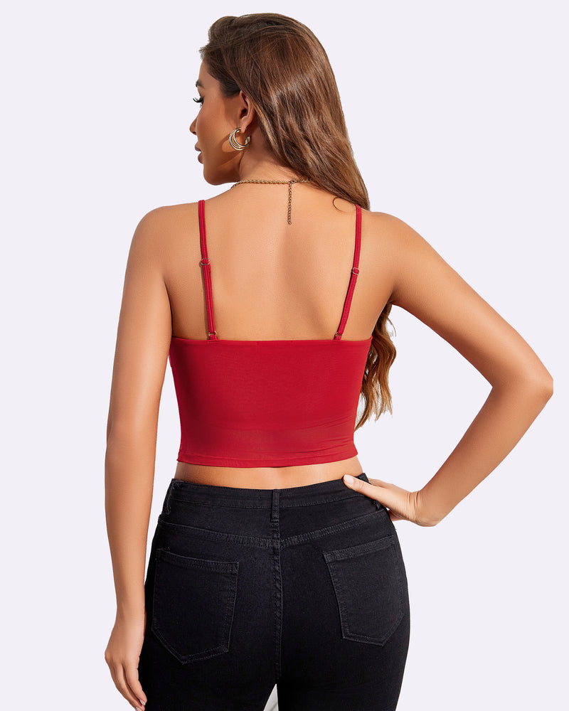 Red mesh spaghetti strap tank top paired with black jeans. Stylish and flattering design.