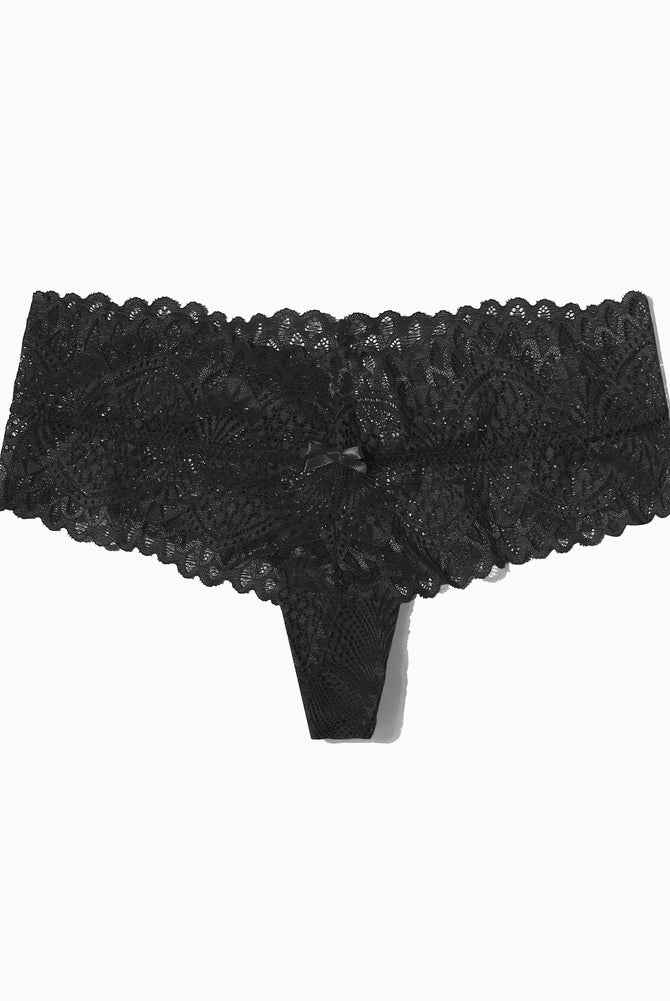 Black lace low-waist thong with floral pattern and bow, designed for comfort and a feminine touch.