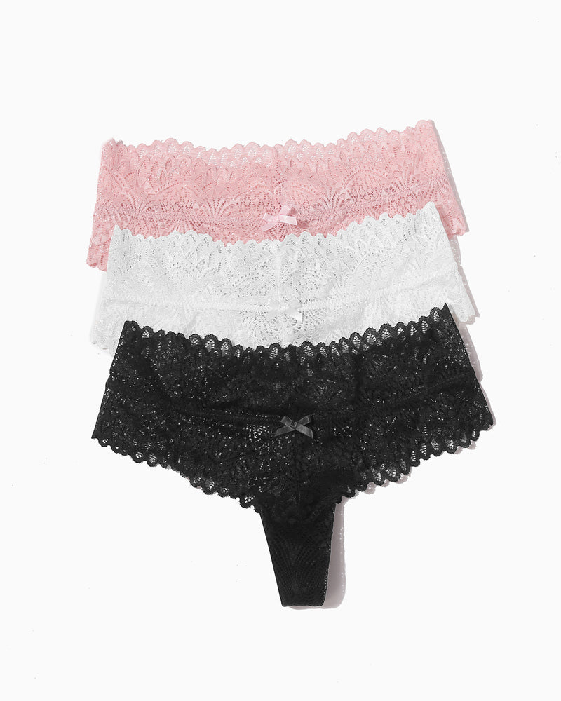 Low-waist floral lace thong panties set in pink, white, and black with bow detail.