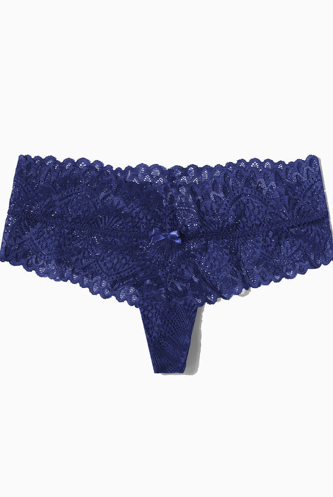 Navy blue floral lace low-waist thong, feminine lingerie with bow detail.