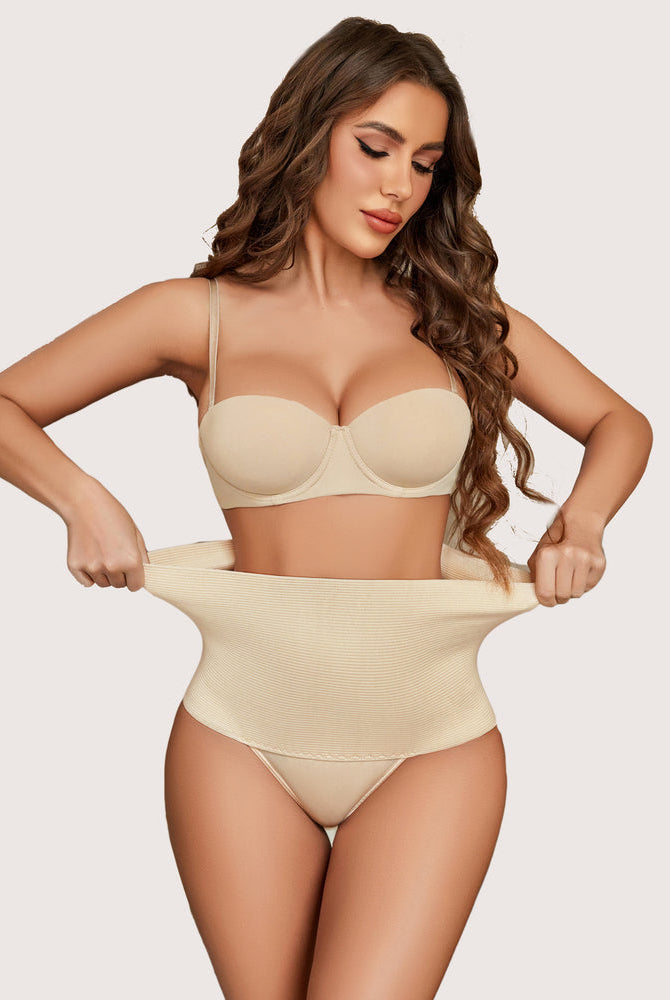 High-waisted beige thong shapewear: Tummy control for hourglass figure, comfortable & confident.