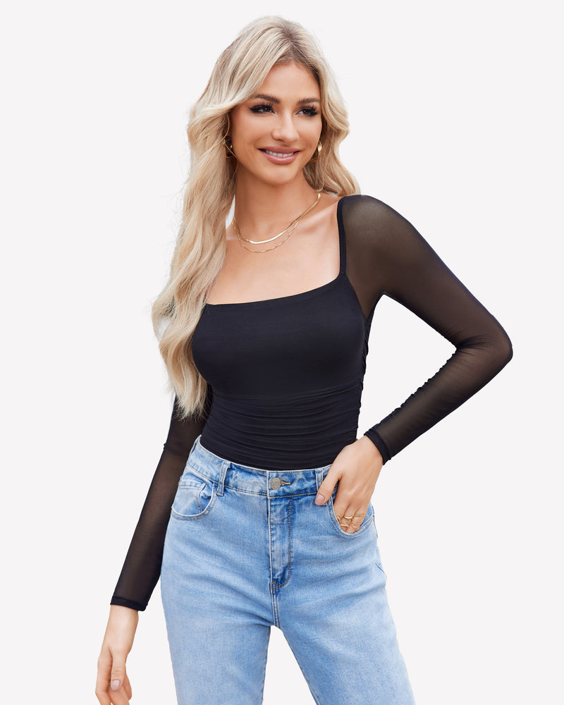 Black square neck mesh bodysuit shapewear, ruched detail, with jeans. Model wearing gold jewelry