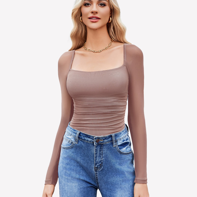 Square neck mesh bodysuit, taupe with long sleeves, ruched detail; model in jeans & gold jewelry.
