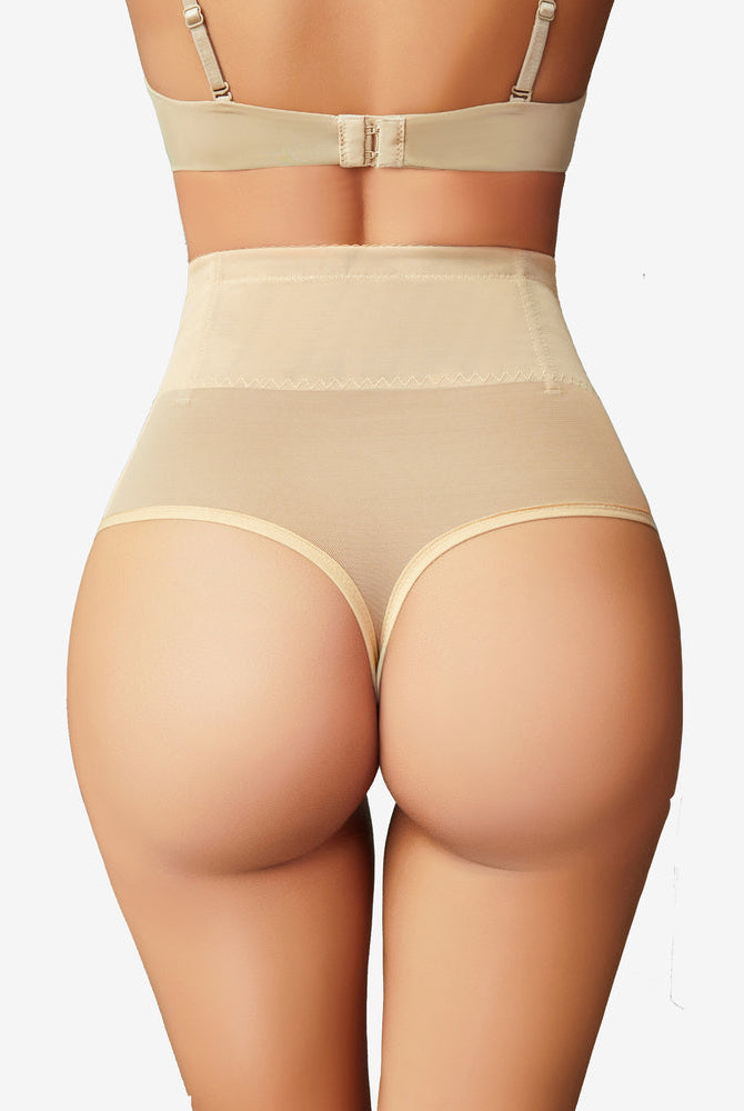 Beige high-waisted tummy control thong shapewear with mesh design and hook closure