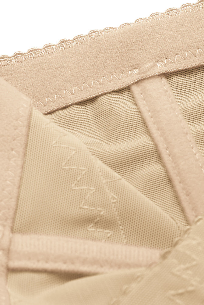 Beige tummy control shapewear close-up: breathable mesh, firm waist control