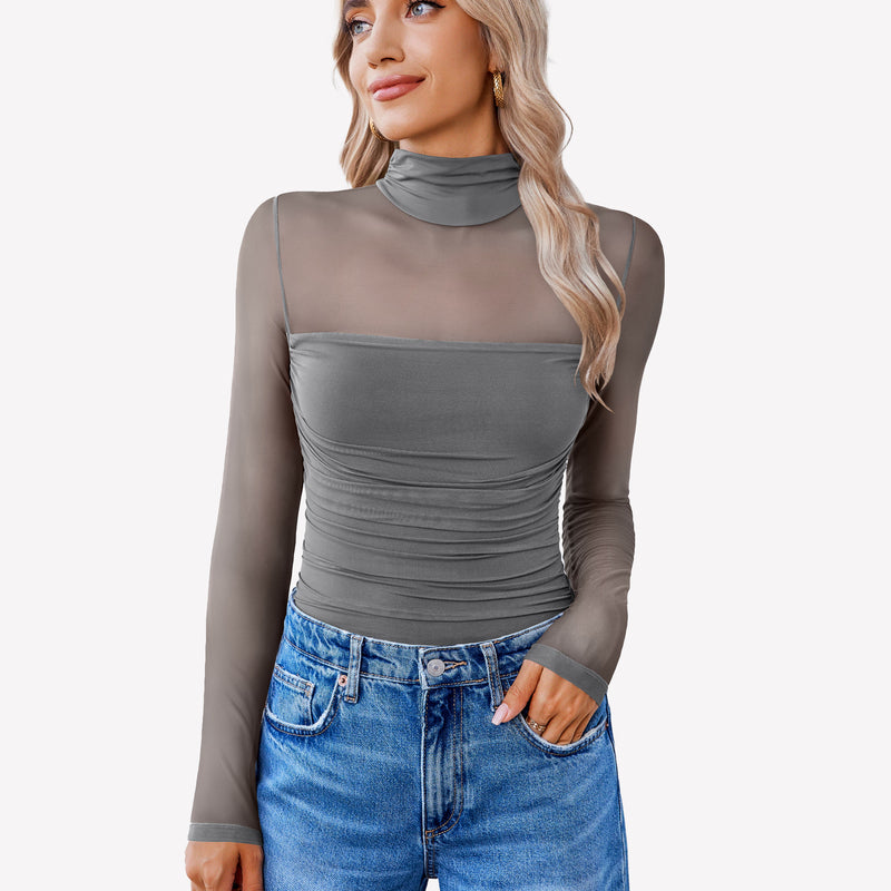 Grey mesh turtle neck bodysuit with ruched front and blue jeans. Perfect going out outfit for women.
