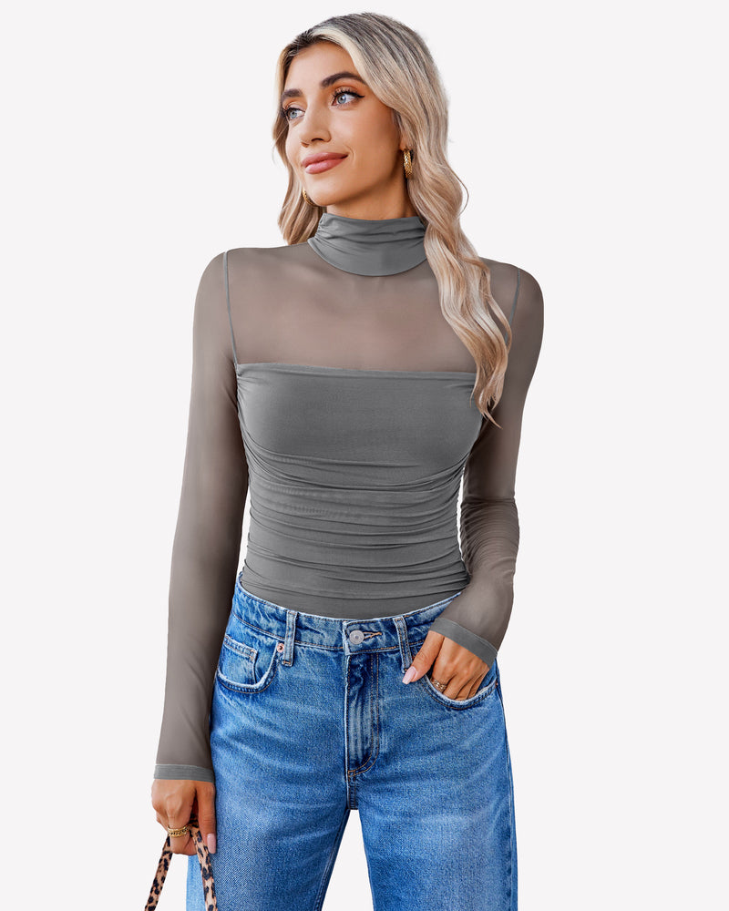 Grey mesh turtle neck bodysuit with ruched front and blue jeans. Perfect going out outfit for women.