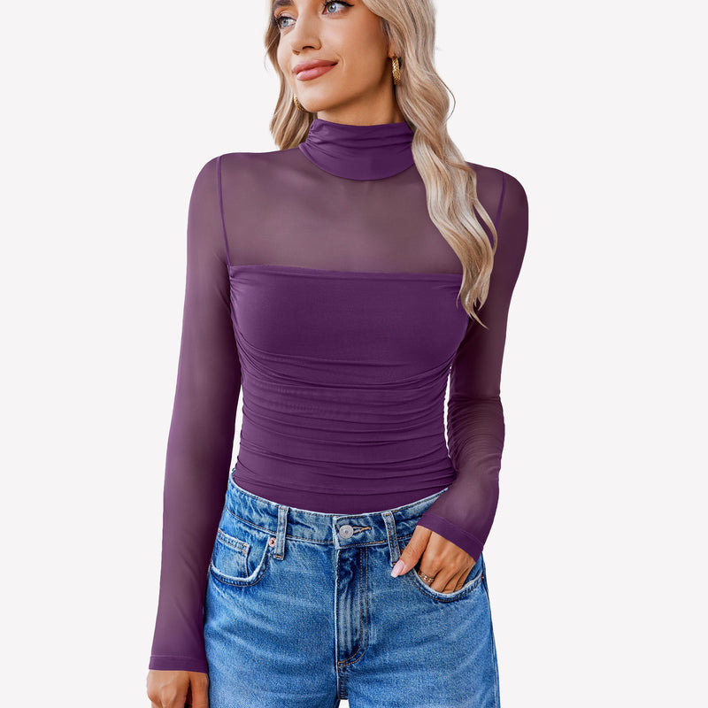 Purple mesh bodysuit with ruched front, and long sleeves, with blue jeans. Perfect going out outfit.