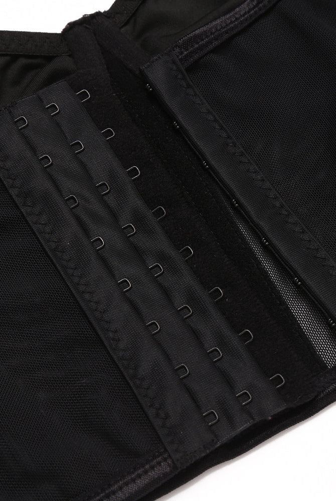 Black bustier with hook closure, adjustable straps, mesh. Perfect for a night out.