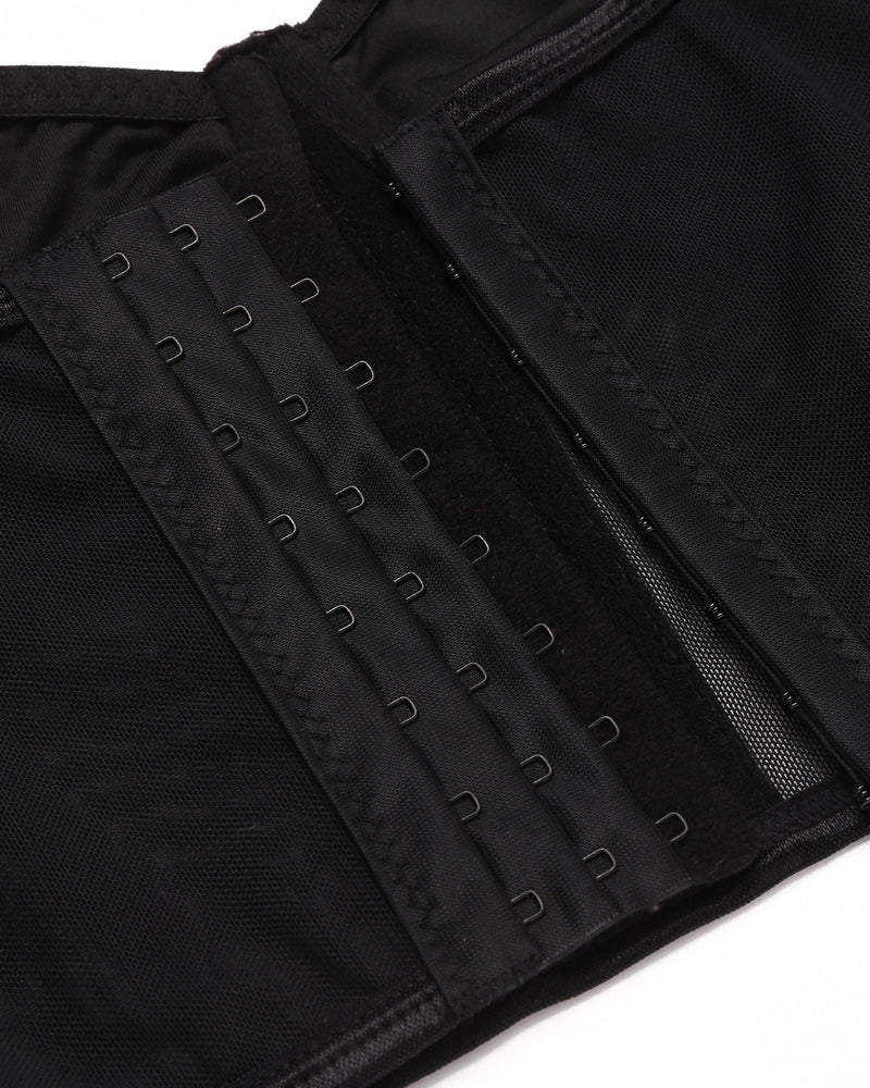 Black bustier with hook closure, adjustable straps, mesh. Perfect for a night out.