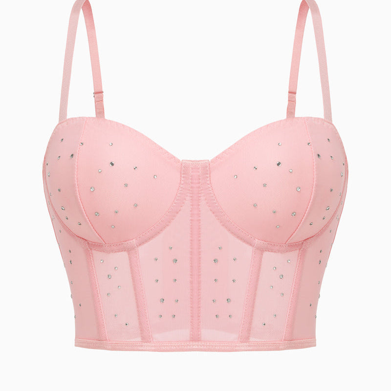 Pink rhinestone corset top with adjustable straps and mesh detail. Sexy bustier for nights out.