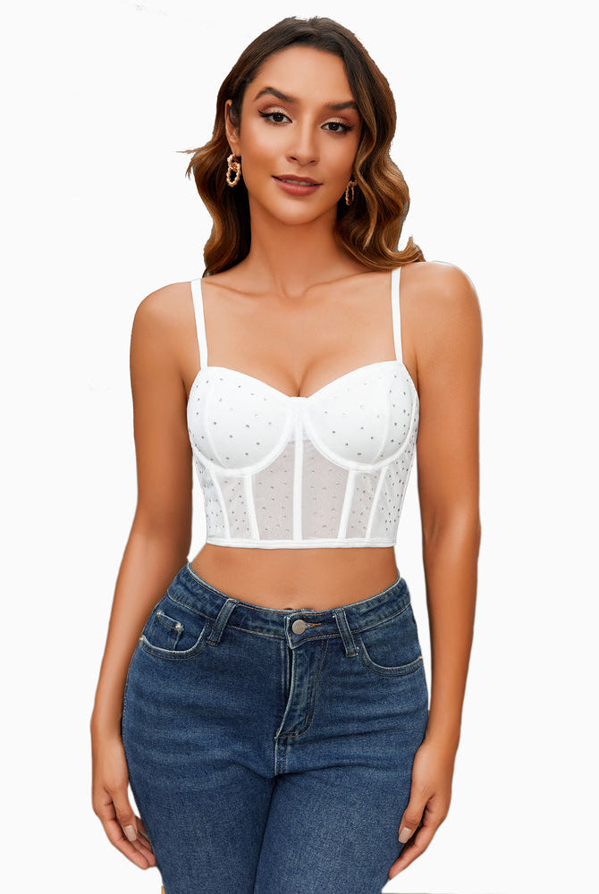White rhinestone bustier top with mesh and adjustable straps, for a night out. Clubbing outfit idea.