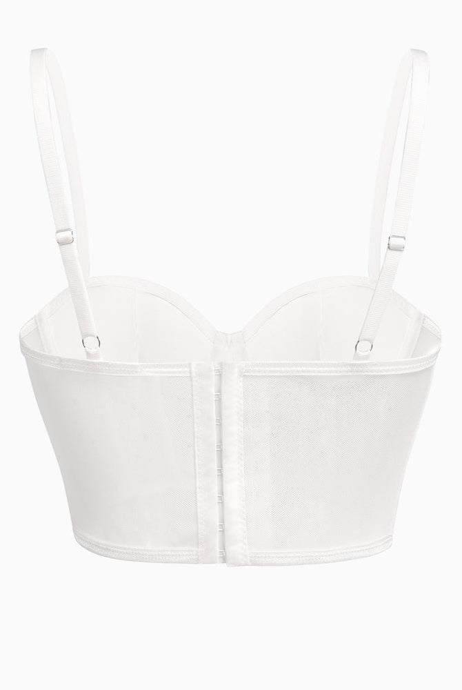 White rhinestone bustier top with adjustable straps, hook closure, and mesh detail. Clubbing outfit.