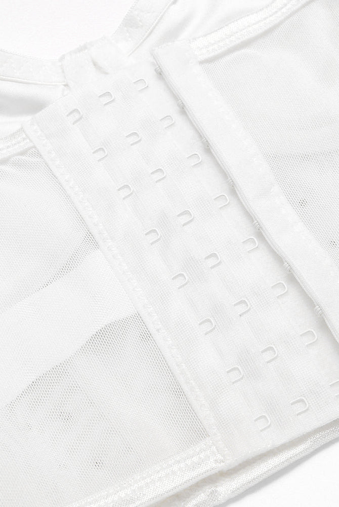 White rhinestone corset top: hook closure, adjustable straps, mesh detail, perfect for nights out