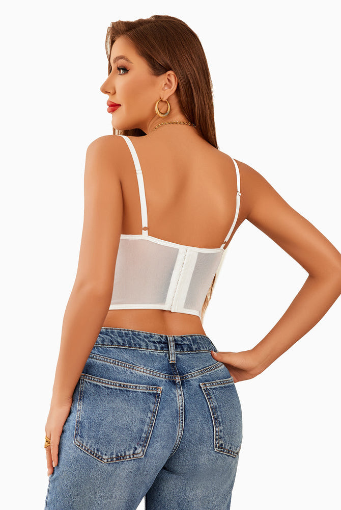 White mesh corset bustier, adjustable straps, and hook closure, perfect for nights out.