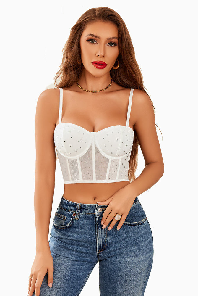 White rhinestone bustier top with mesh and adjustable straps. Slim fit, perfect for a night out.