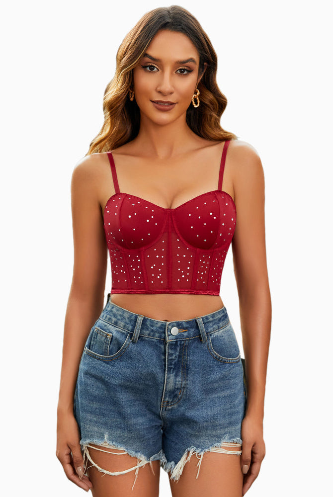 Rhinestone corset top, burgundy with mesh and adjustable straps, paired with denim shorts. Sexy.