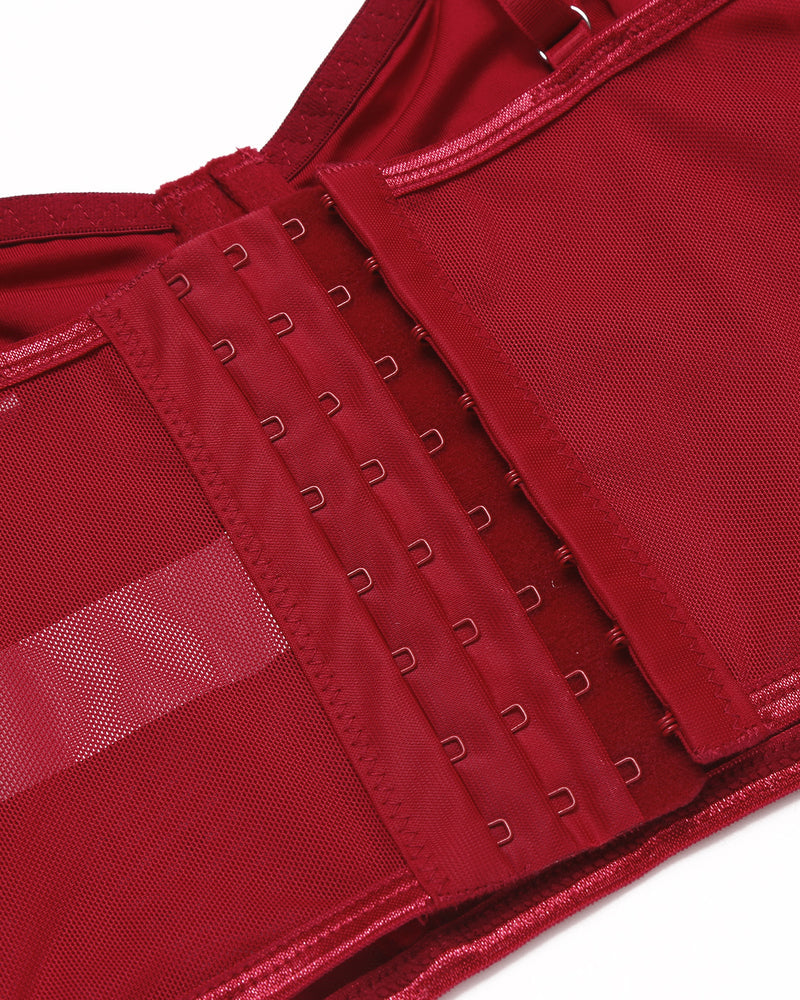 Red corset top with hook closure, adjustable straps, and mesh details. Slim fit bustier.