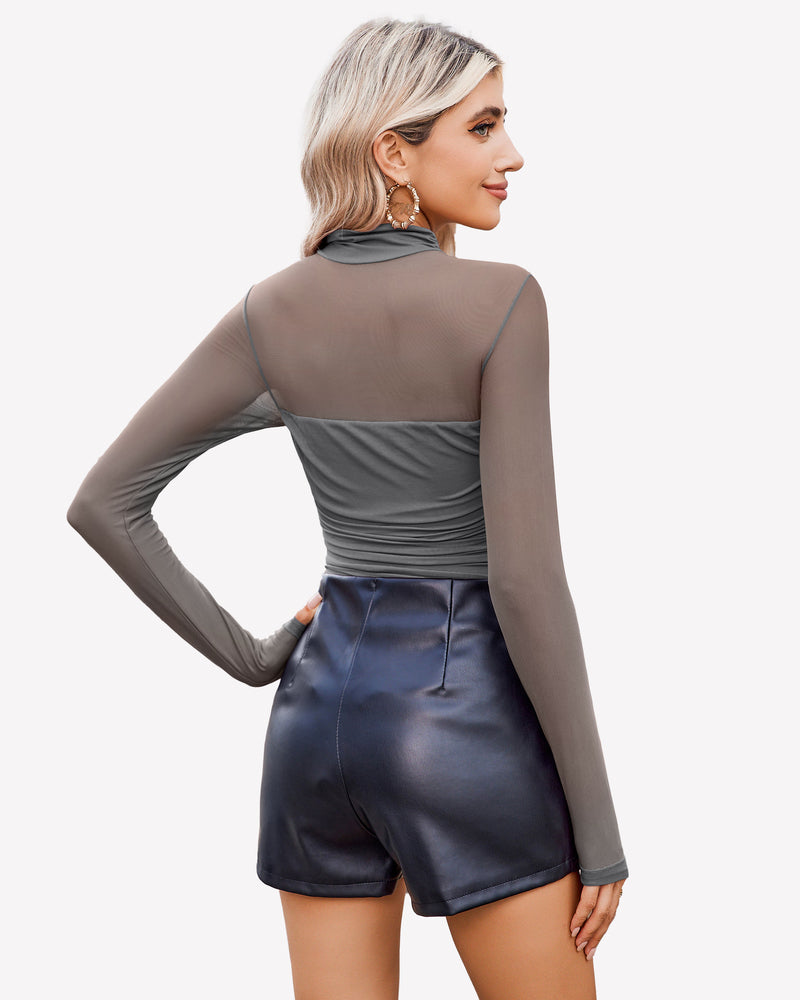 Grey mesh turtleneck bodysuit, ruched front, black shorts. Going out outfit.