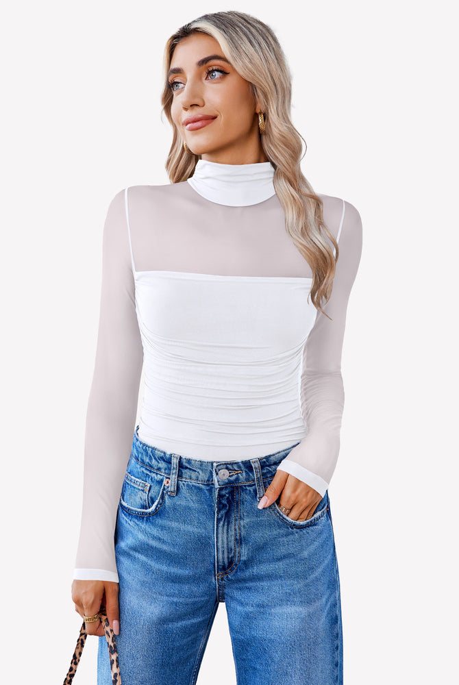 White mesh turtleneck bodysuit, ruched front, with blue jeans. Going out outfit for women.