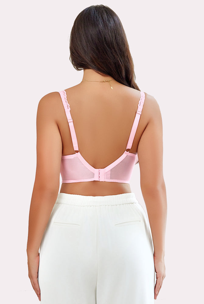 Pink lace bralette, underwire, adjustable straps, paired with white trousers. Sexy lingerie