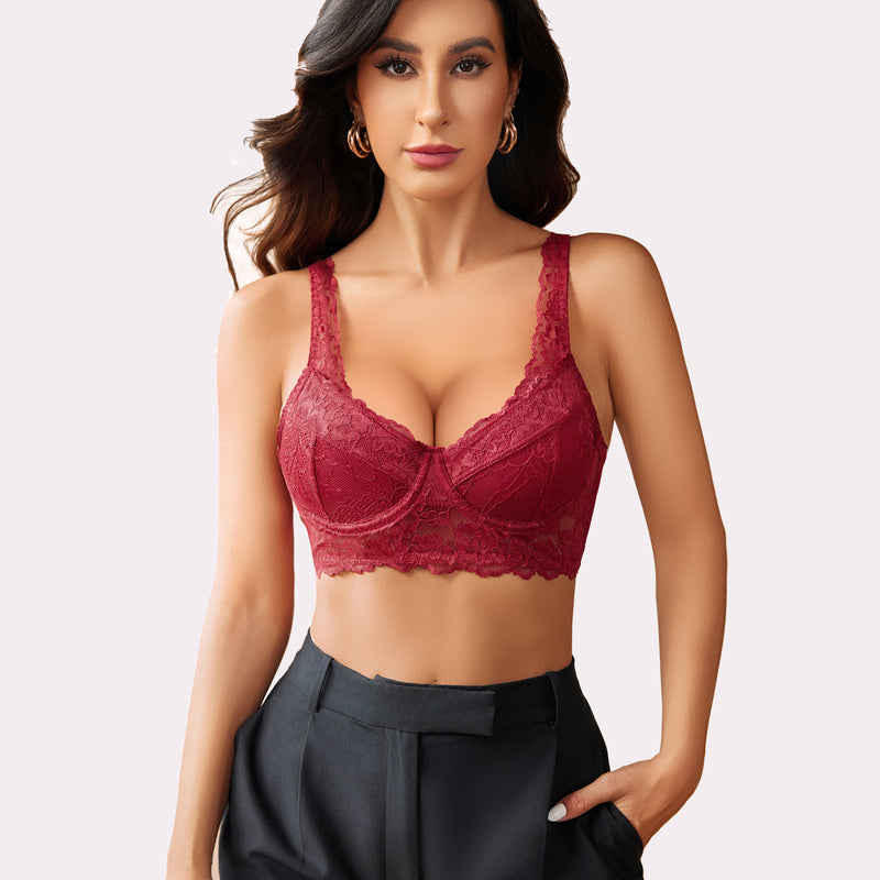 Ruby red lace underwire bralette, floral design, paired with dark gray trousers. Sexy lingerie.