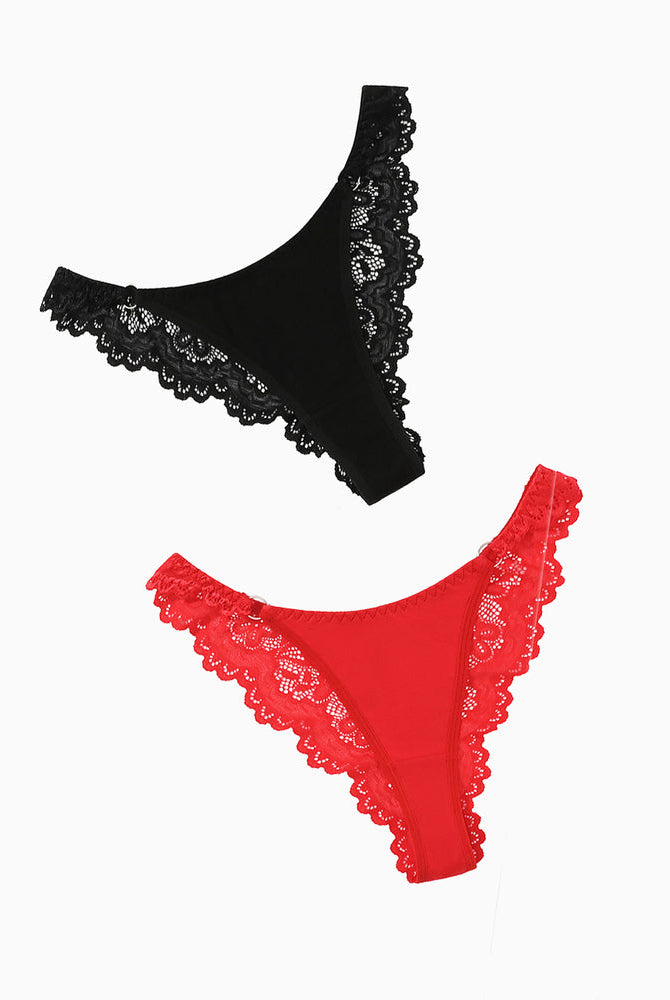 Black and red string panties with lace trim. Low-rise cheeky design, sexy lingerie for women.
