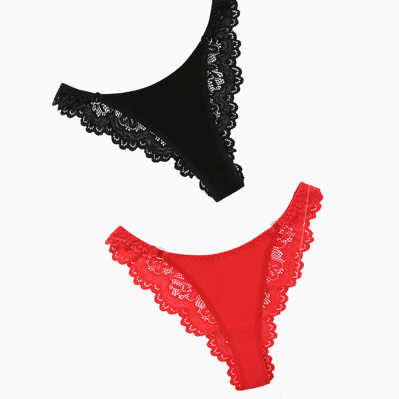Black and red string panties with lace trim. Low-rise cheeky design, sexy lingerie for women.