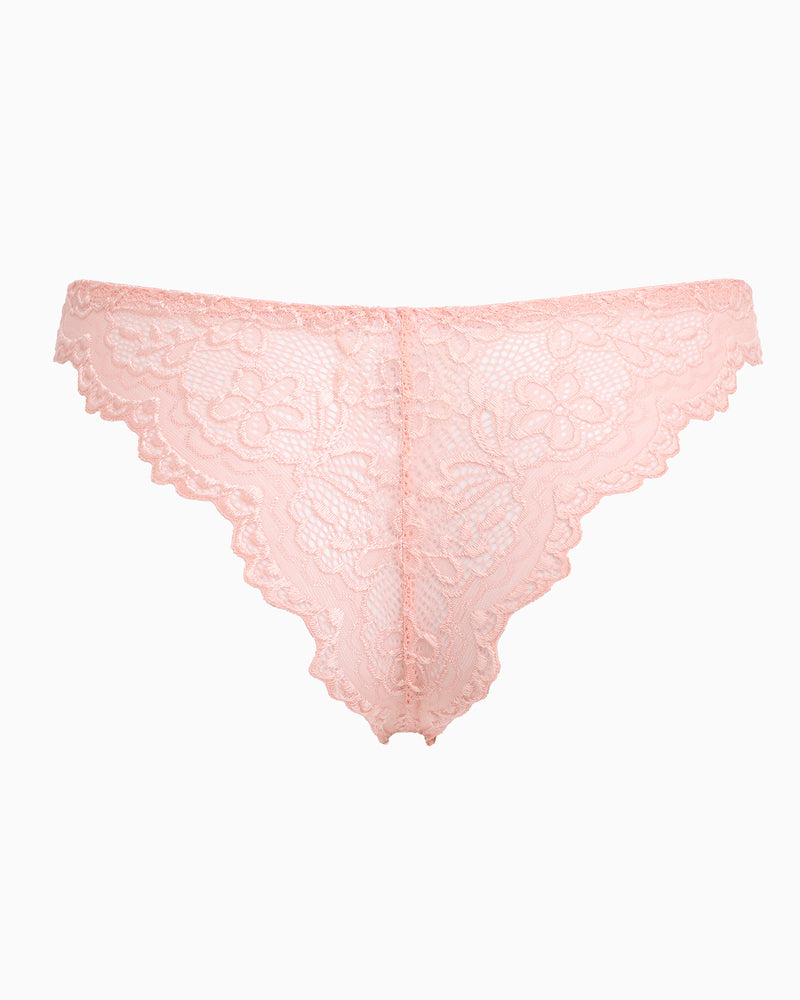 Light pink floral lace string panty. Low-rise cheeky design. Soft, charming lingerie for women.
