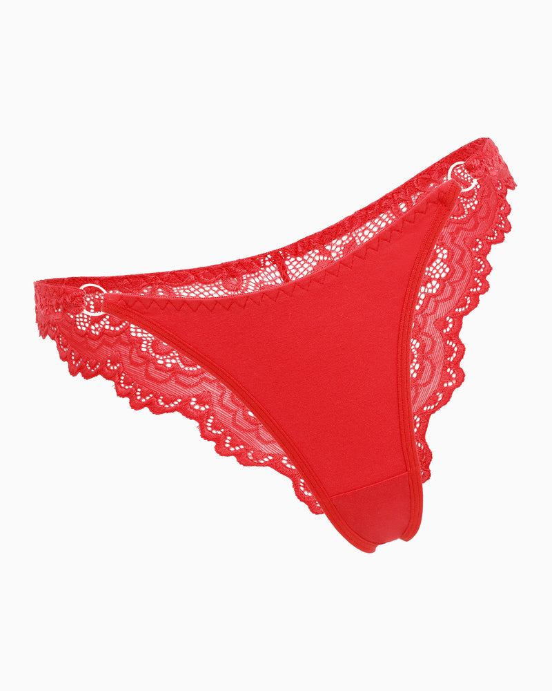 Red string panty with lace trim and ring detail. Low-rise cheeky design, sexy lingerie for women.