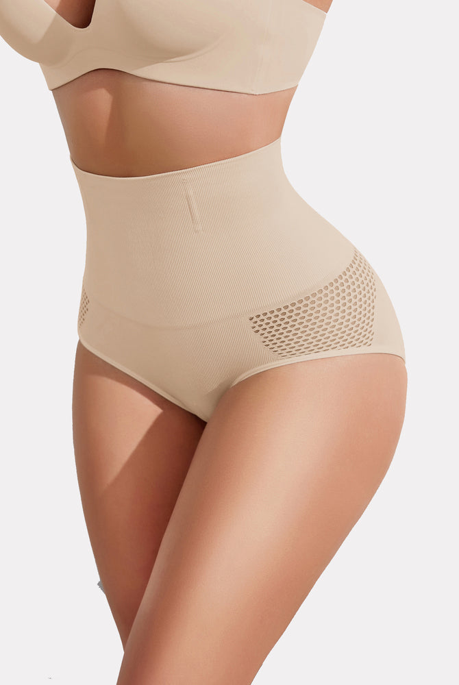 Beige high-waisted tummy control shapewear panty with mesh detail creating a slimmer curve for women