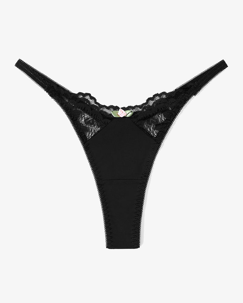 Black lace G-string thong. Sexy T-back panties with a delicate rose accent for a confident look.