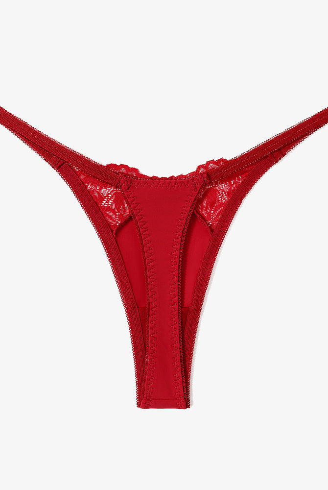 Red lace G-string thong. Sexy T-back style lingerie. Nylon & Spandex blend.