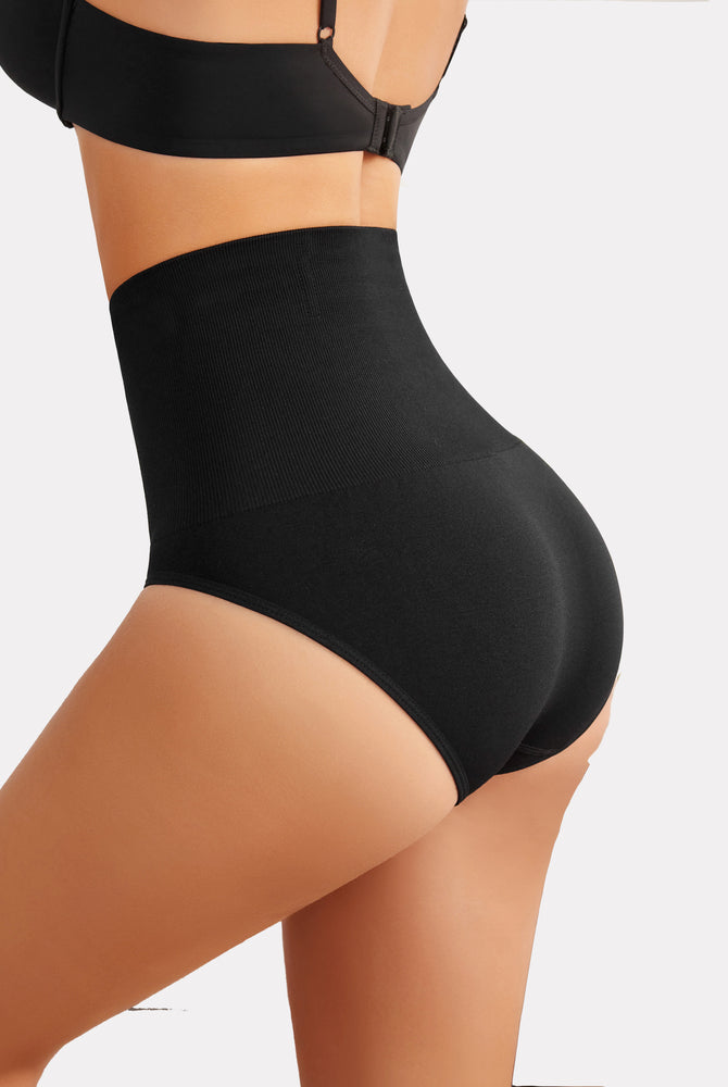 Black high-waisted tummy control thong shapewear, enhancing curves and offering a smooth silhouette