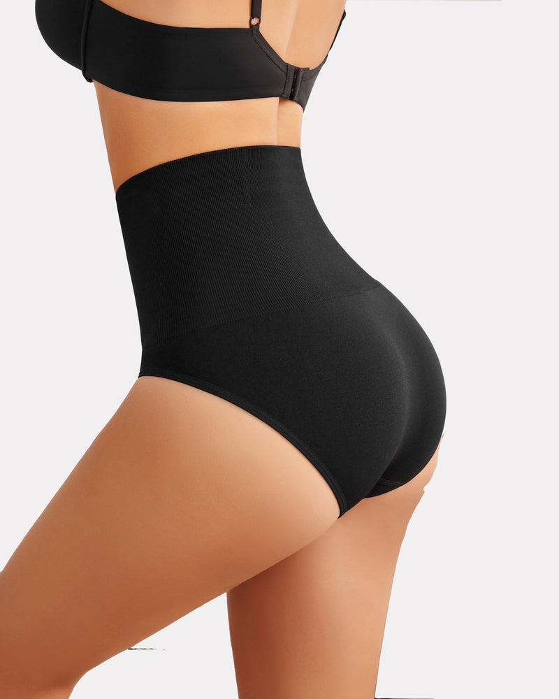 Black high-waisted tummy control thong shapewear, enhancing curves and offering a smooth silhouette