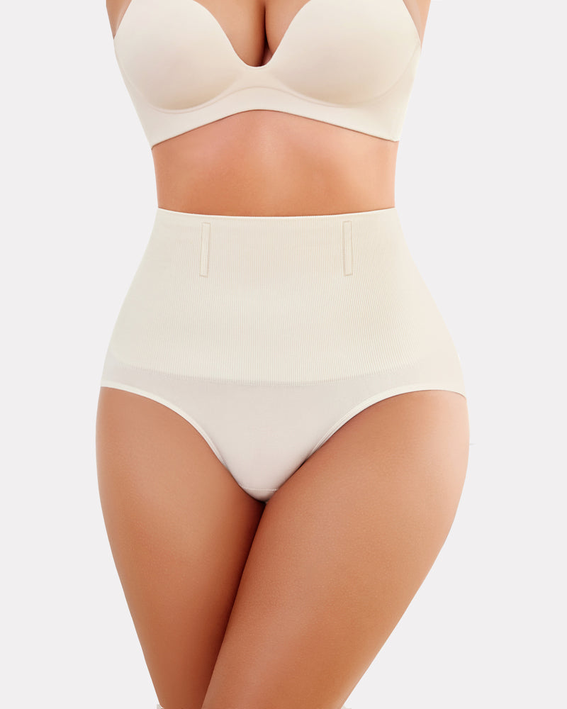 Beige high-waisted tummy control shapewear, enhancing curves and offering a smooth silhouette