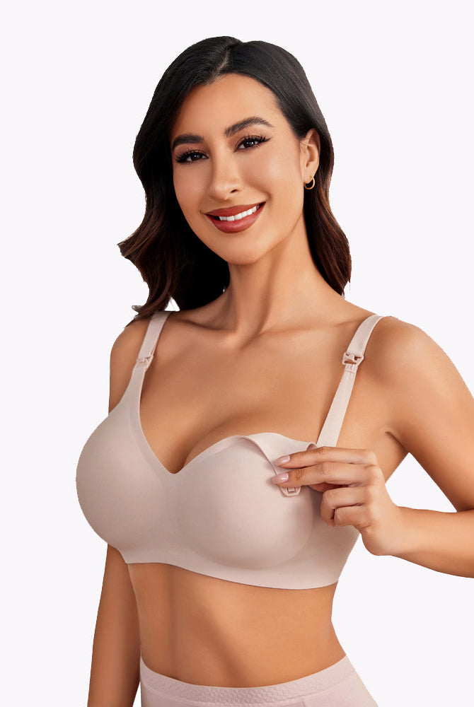 Beige seamless maternity nursing bra with easy nursing buckle, model wearing; comfortable for moms
