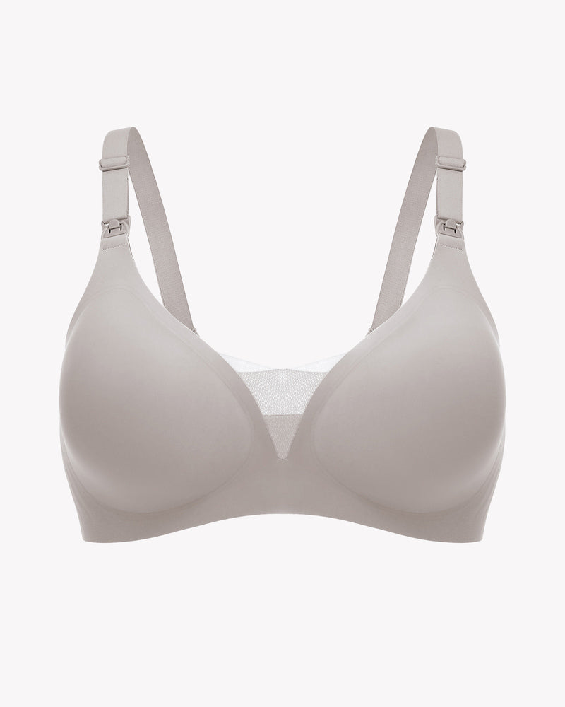 Light grey wireless nursing bra with adjustable straps and breastfeeding access, comfortable design.