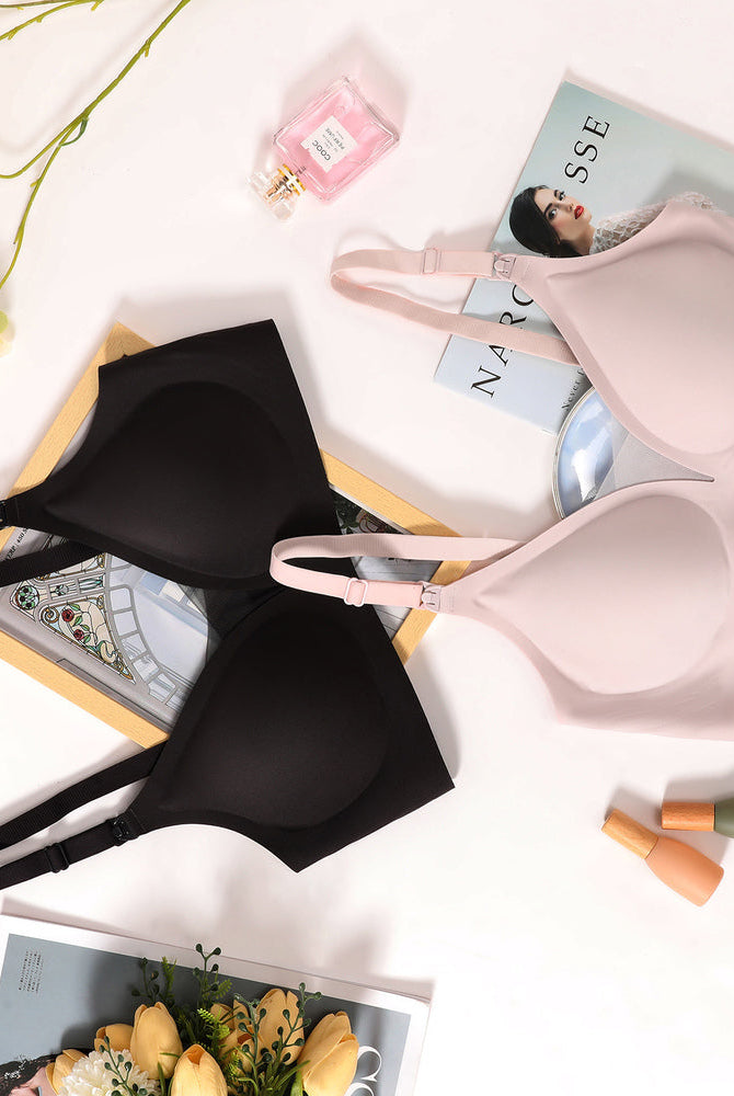 Wireless nursing bras in black and pink, offering comfortable and discreet breastfeeding support.