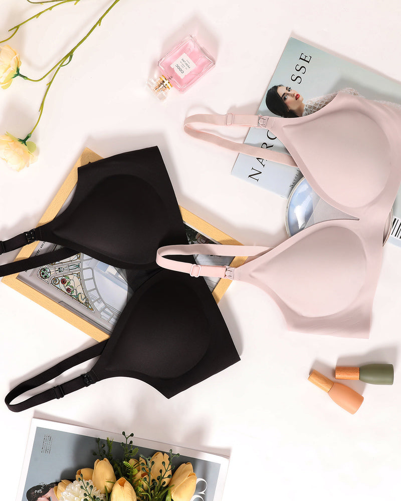 Wireless nursing bras in black and pink, offering comfortable and discreet breastfeeding support.