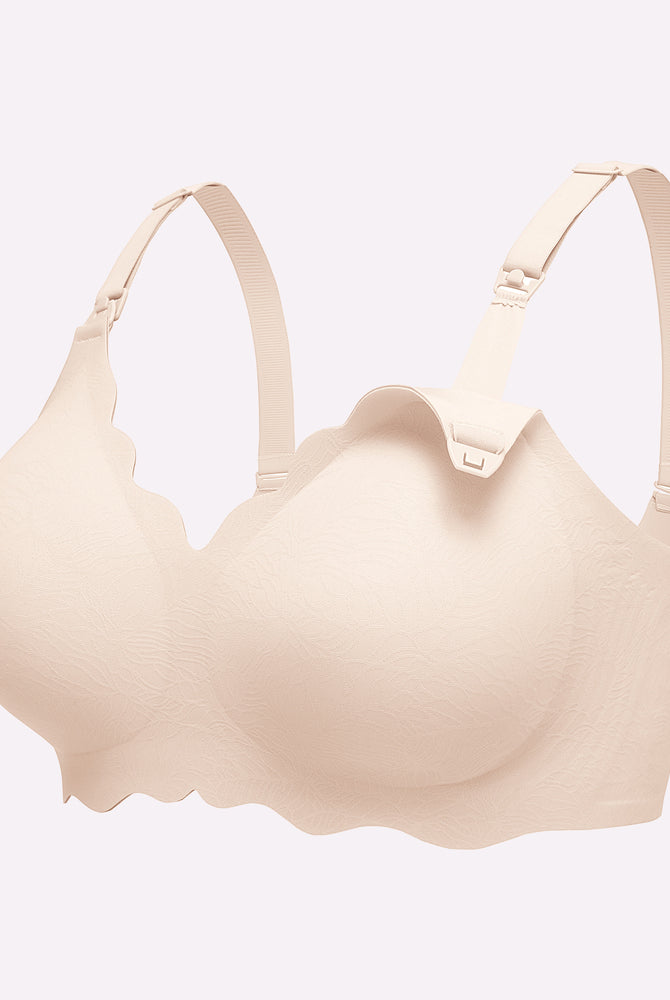 Beige seamless nursing bra with adjustable straps, easy nursing access, and comfortable design