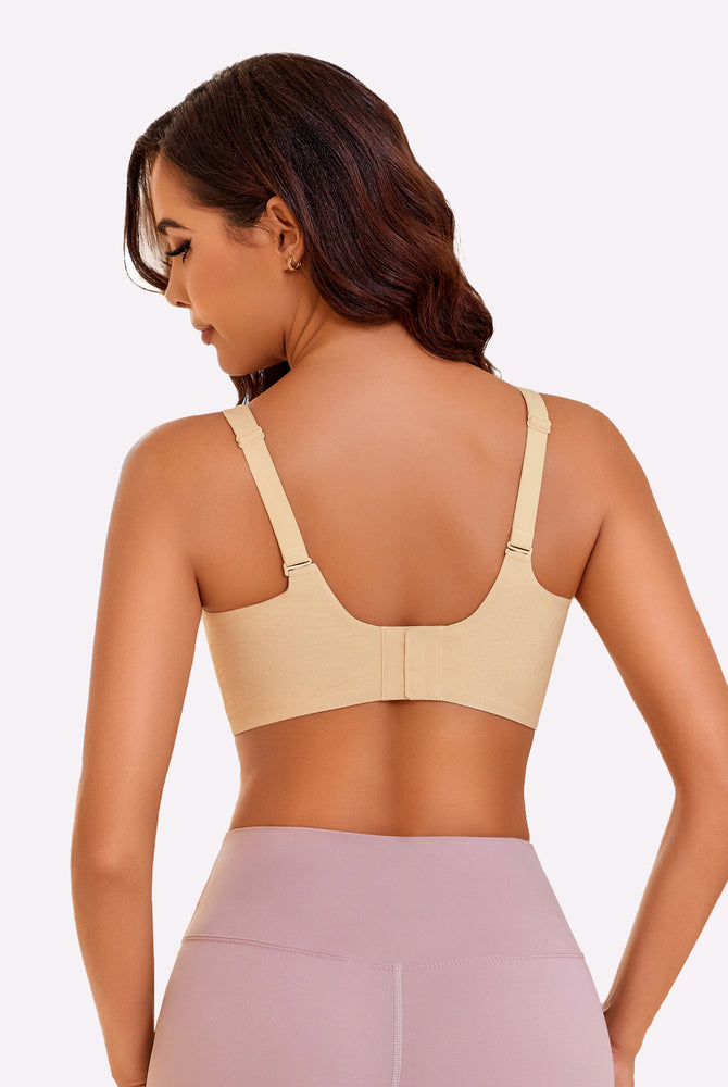 Seamless beige maternity nursing bra with adjustable straps for comfortable support and easy nursing.