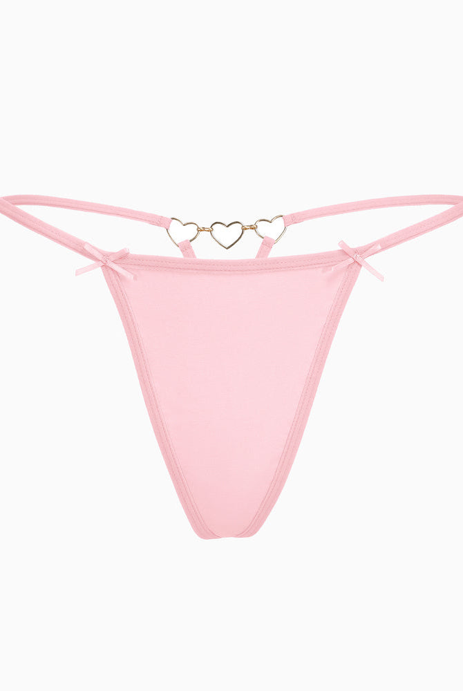 Pink G-string thong with gold heart ring and bow details. Comfortable and sexy lingerie for women.