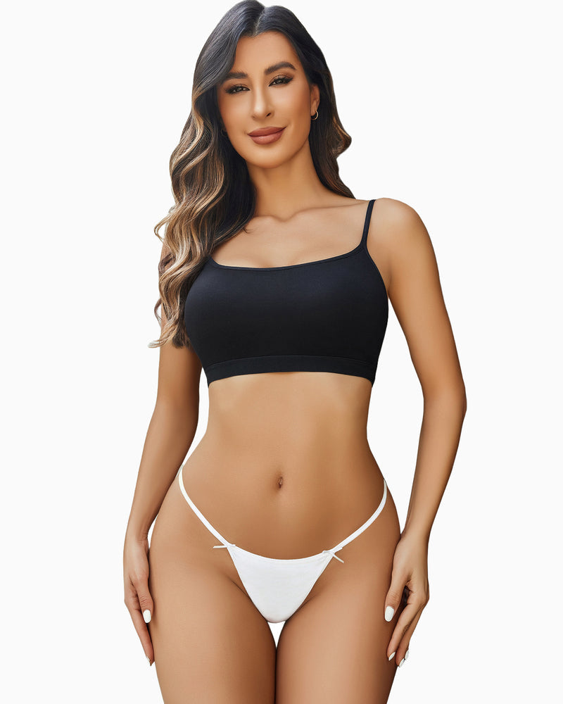 Woman in black crop top and white G-string thong. Sexy and comfortable lingerie.